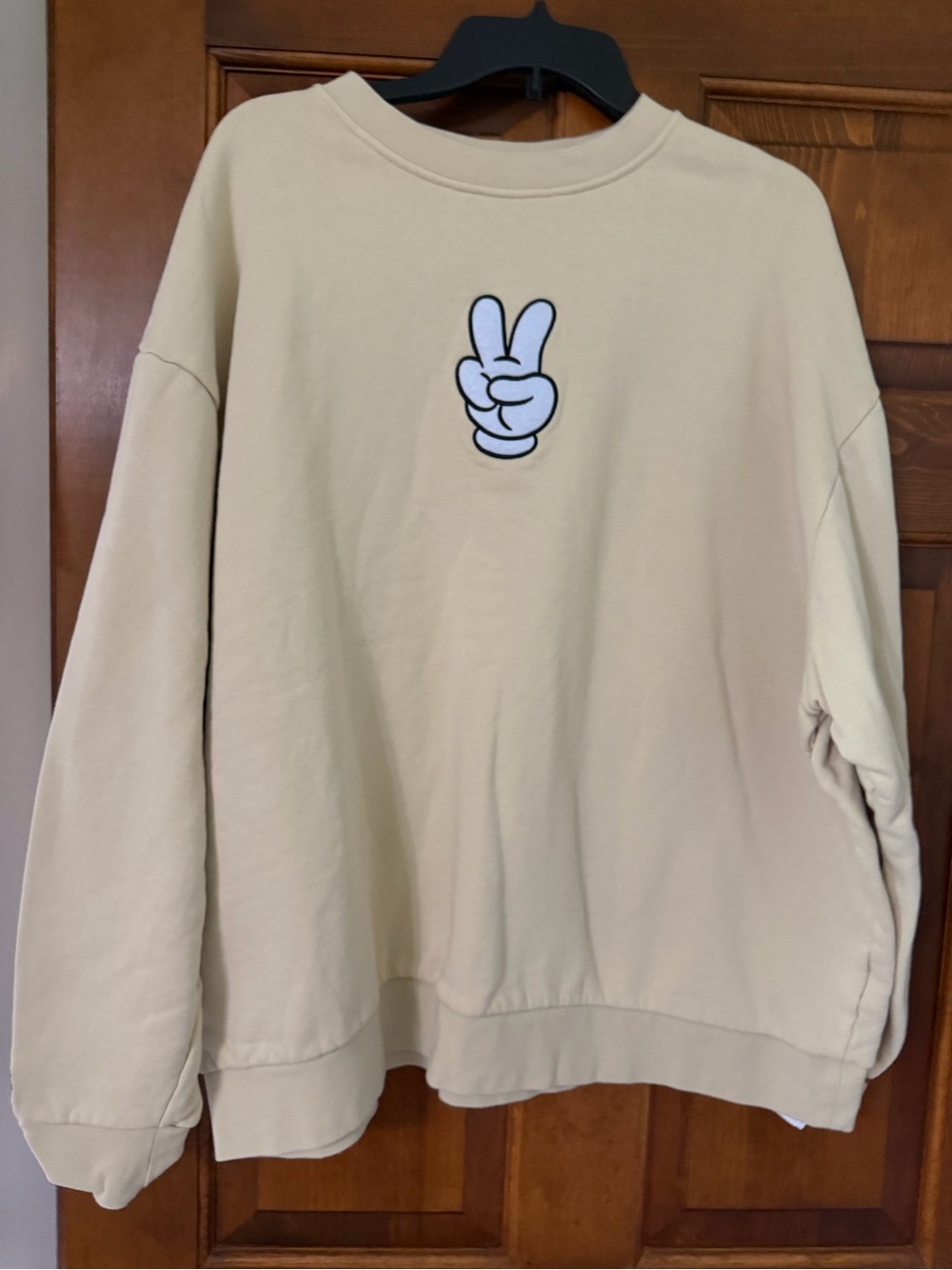 Disney Cream Crewneck Sweater with Peace Hand Graphic